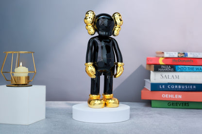 Kaws Sculpture Metallic Black with Gold Chrome Accents Home Decor (14 x 30 x 8 cm)
